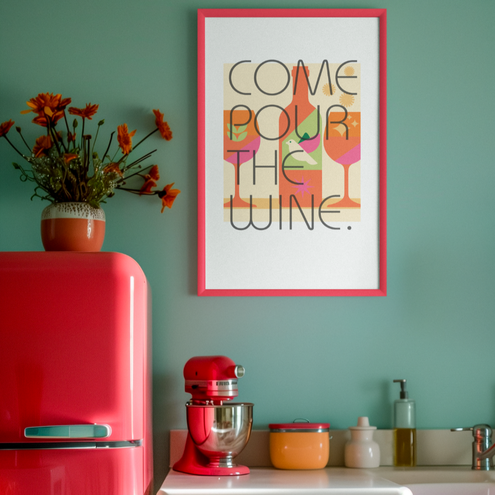 Colorful kitchen with red refrigerator, turquoise cabinets, and a 'Come pour the wine' poster.