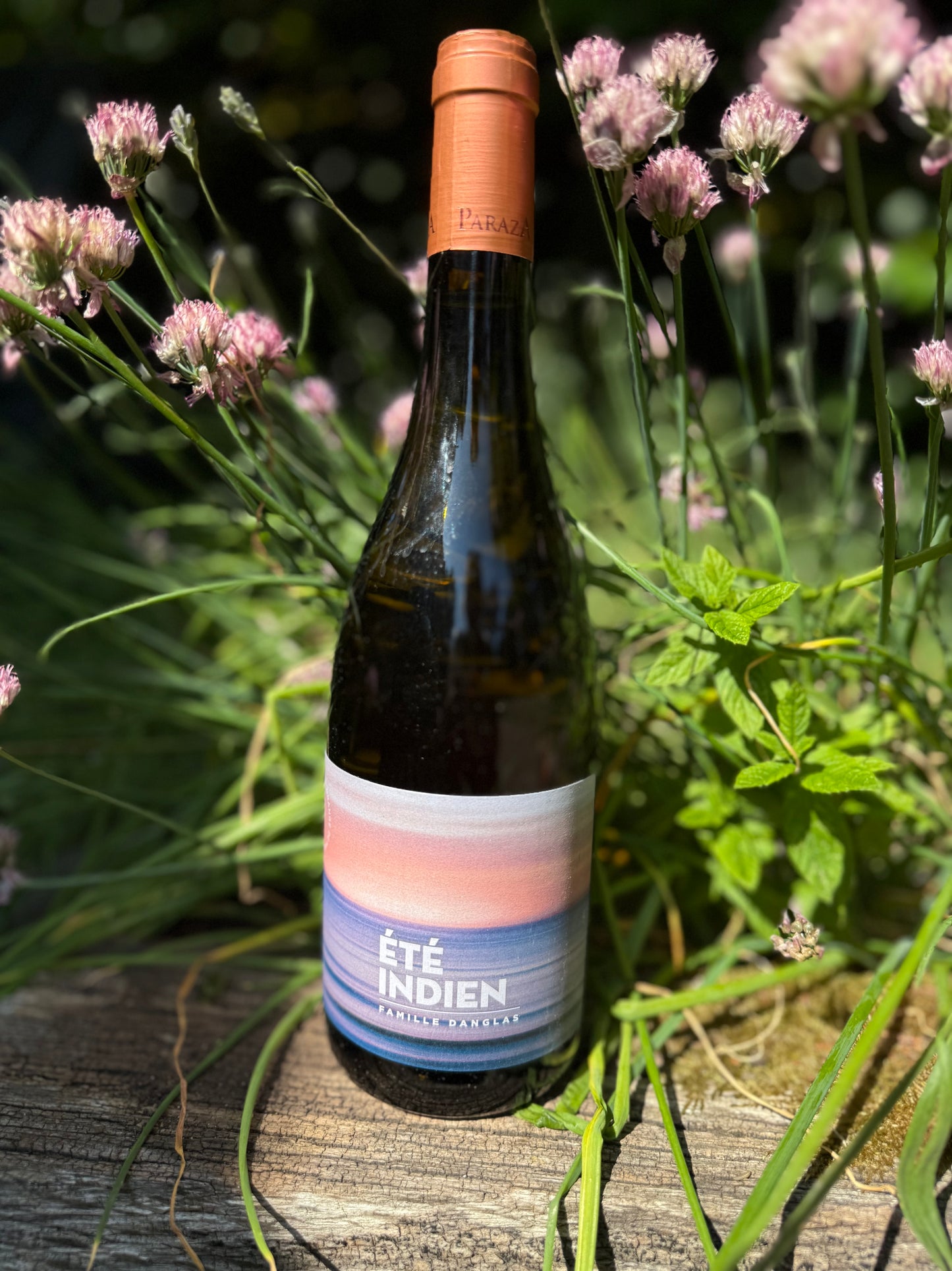 Été Indien natural orange wine by Château de Paraza, boutique vineyard and hotel in Languedoc — organic skin-contact wine in garden setting.