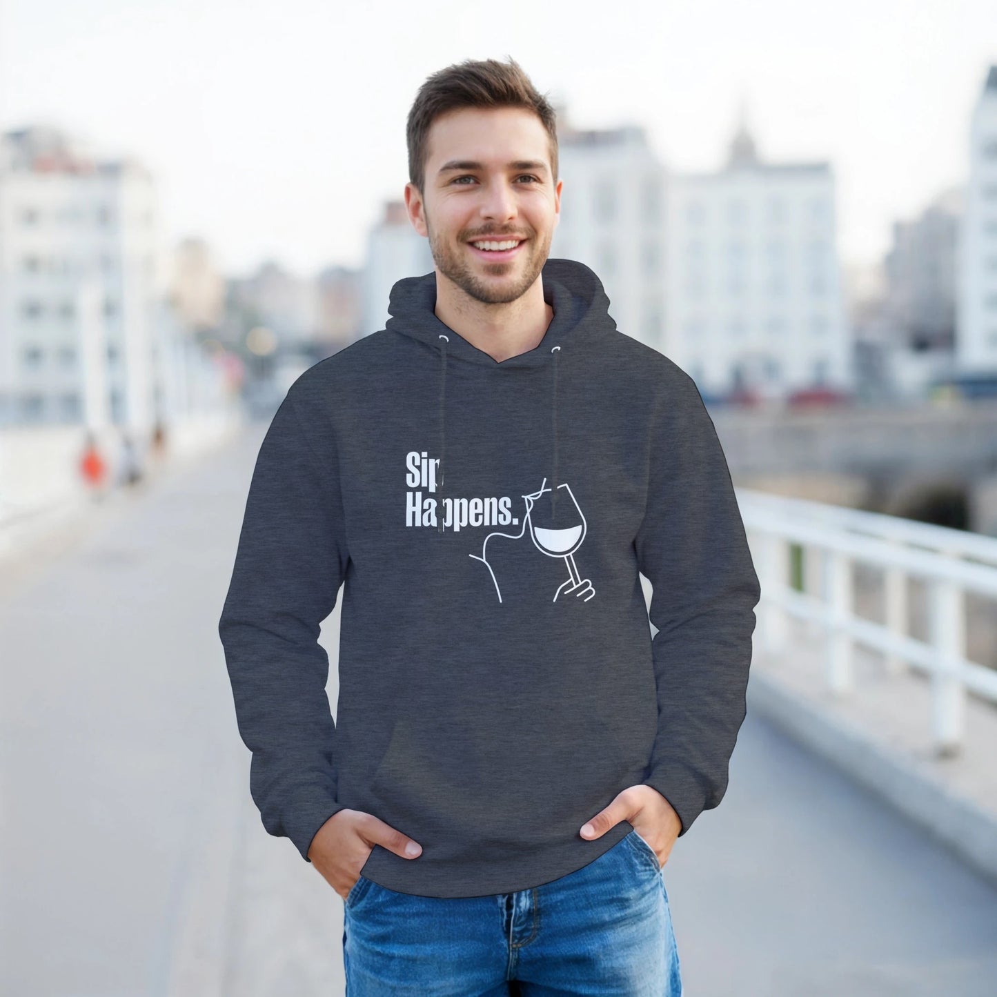 Man wearing a dark hoodie with 'Sir Happens' text and graphic, standing outdoors.