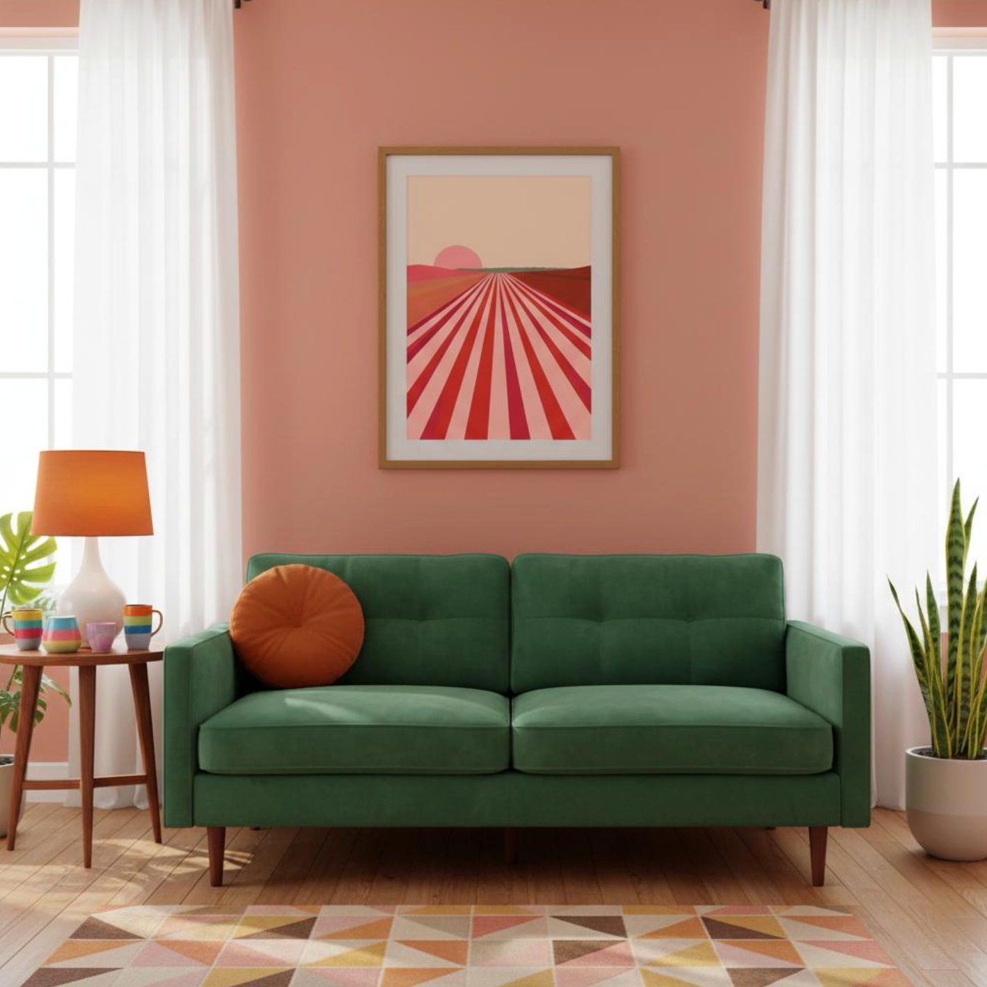 Taste Union vineyard dawn art print with soft pink and coral tones, styled in a warm living room with a green sofa and geometric rug — modern design meets vineyard-inspired calm.