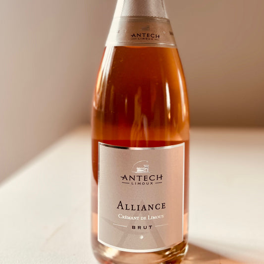 Bottle of Antech Alliance Rosé - Organic sparkling wine from Limoux, featuring fresh raspberry and rose flavours, perfect for pairing with seafood and vegetarian dishes.