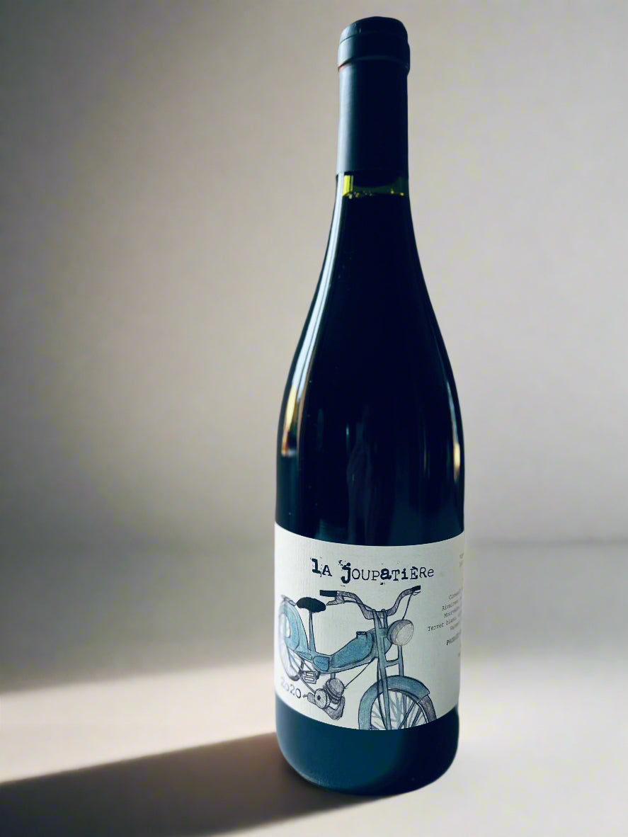 A bottle of Colline de l'Hirondelle La Joupatière 2020 red wine, featuring a unique label design with a vintage blue motorbike illustration.

