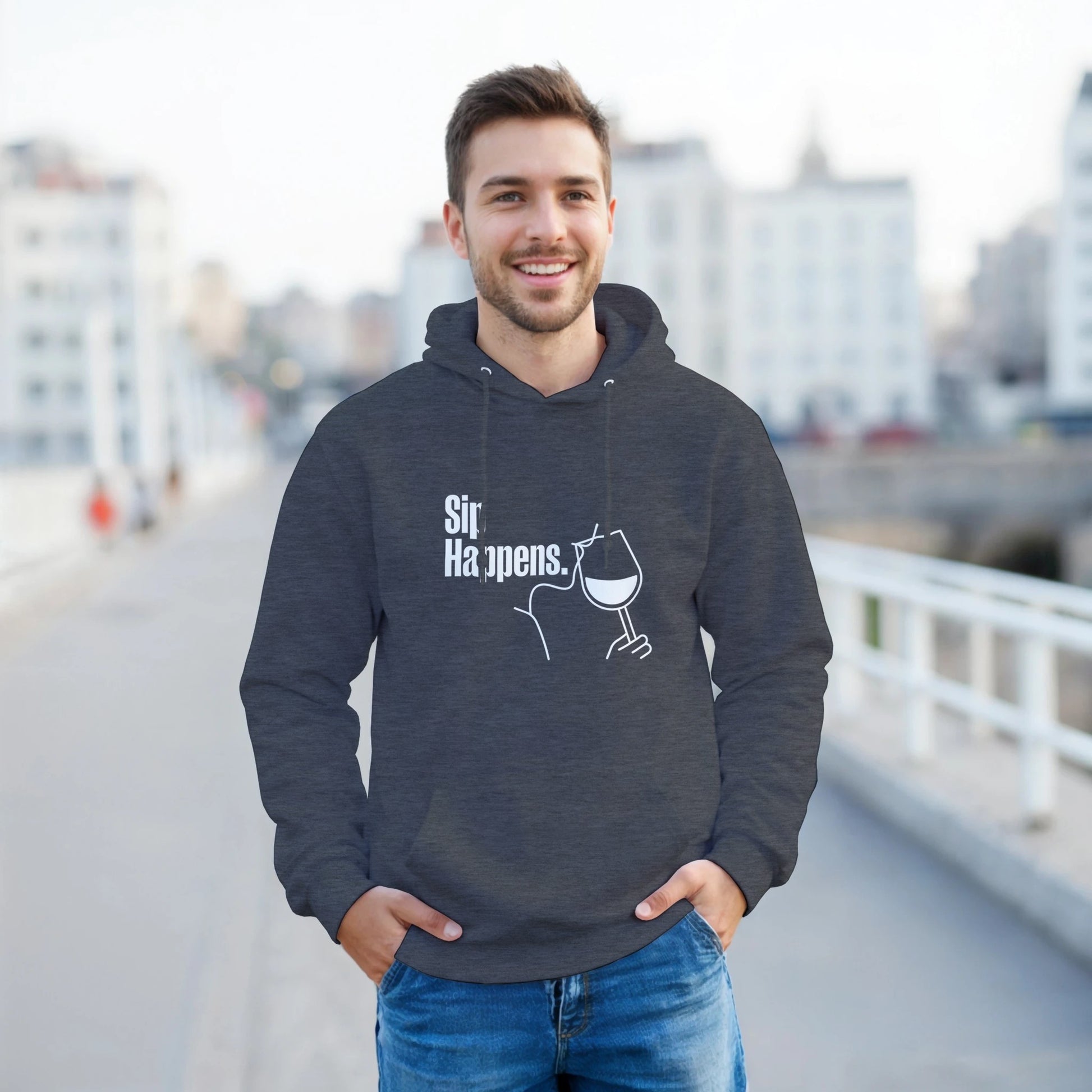 Man wearing a dark hoodie with 'Sir Happens' text and graphic, standing outdoors.