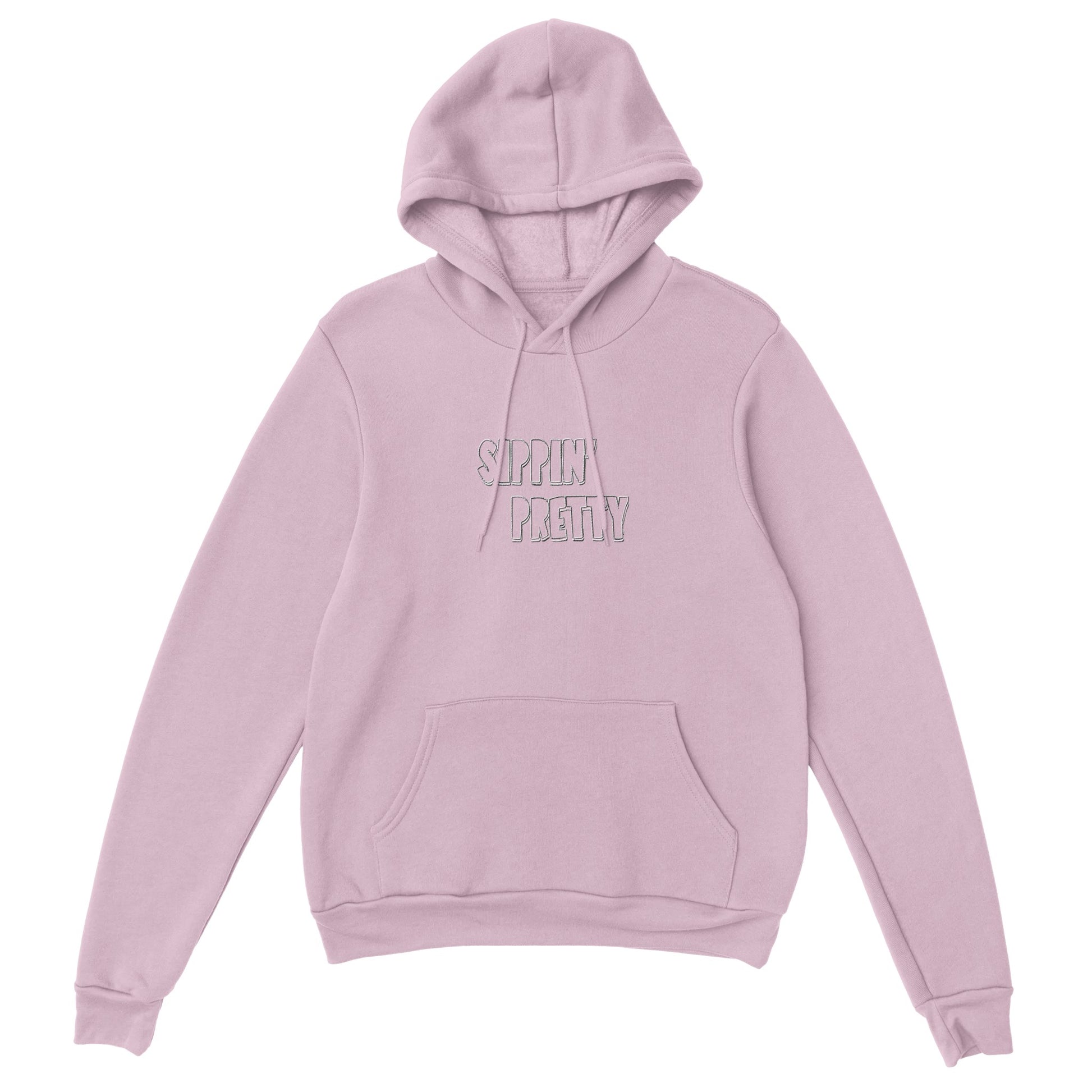 Pink hoodie with white embroidered text ‘Sippin’ Pretty’. Sustainable unisex hoodie by Taste Union with relaxed oversized fit.