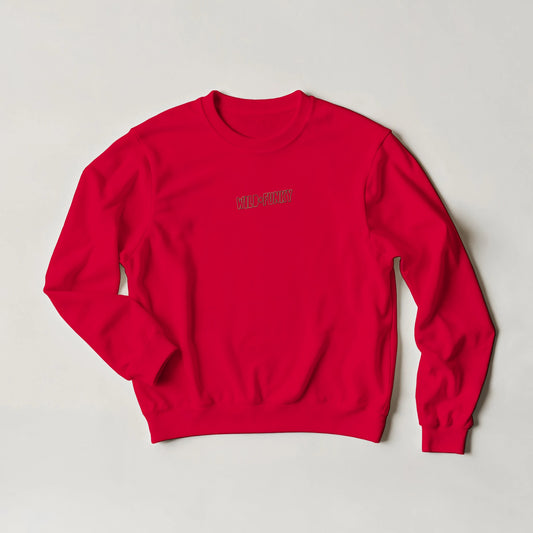 Red embroidered sweatshirt with gold stitched text ‘Wild + Funky’ — unisex oversized sustainable sweatshirt by Taste Union.