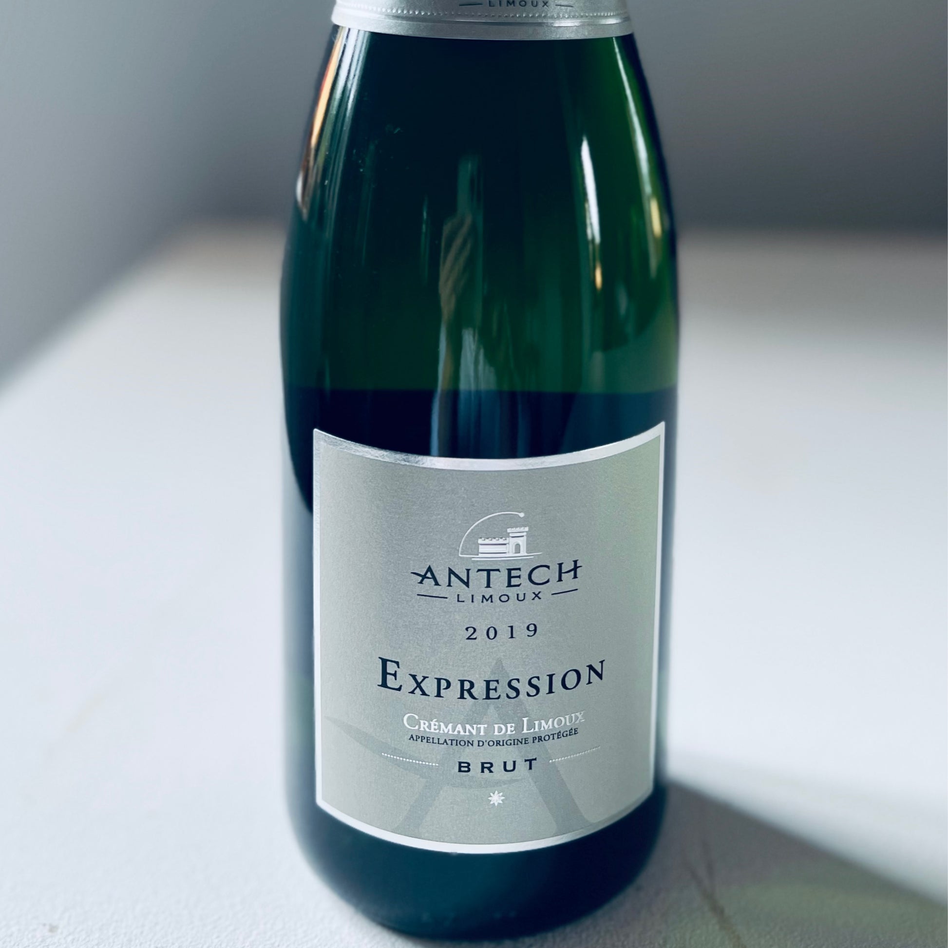 Bottle of Antech Crémant de Limoux Blanc - Organic sparkling wine from Limoux, featuring green apple and citrus flavours, perfect for aperitifs or pairing with seafood and light dishes.